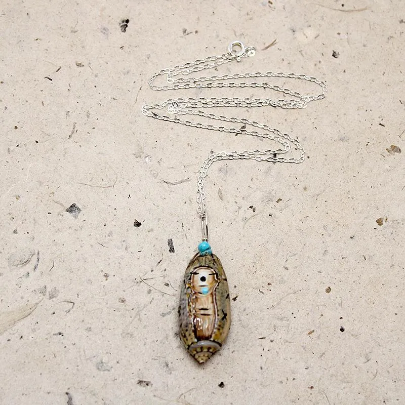 Adorable Carved Snail Shell Corn Maiden Pendant