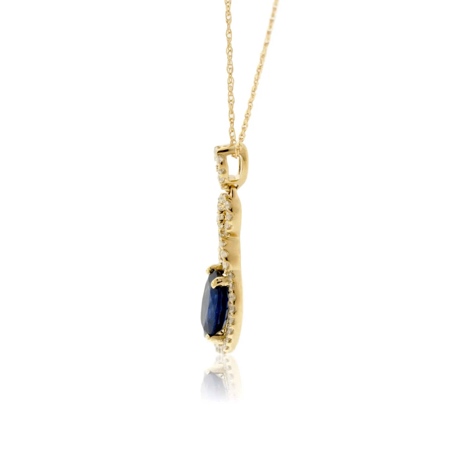 Blue Sapphire and Bypassing Style Diamond Pendant